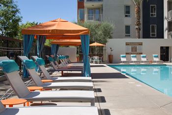 Pool with open-air cabanas and spa area with wi-fi hotspot